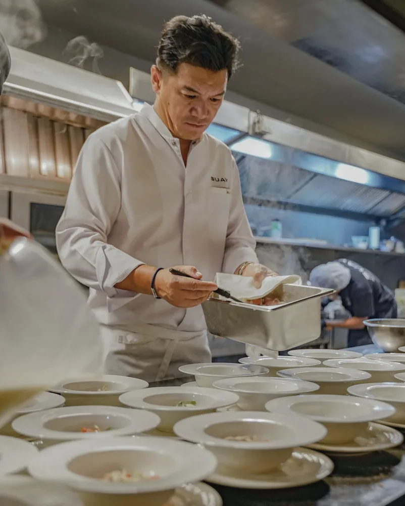 Chef Tammasak Chootong in the SUAY kitchen