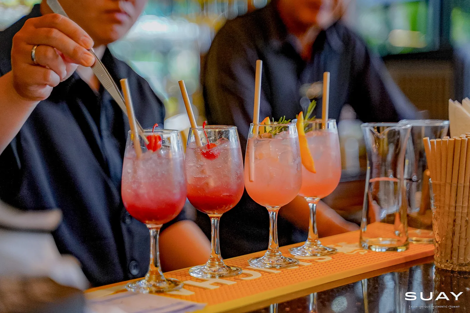 A line of cocktails on the bar
