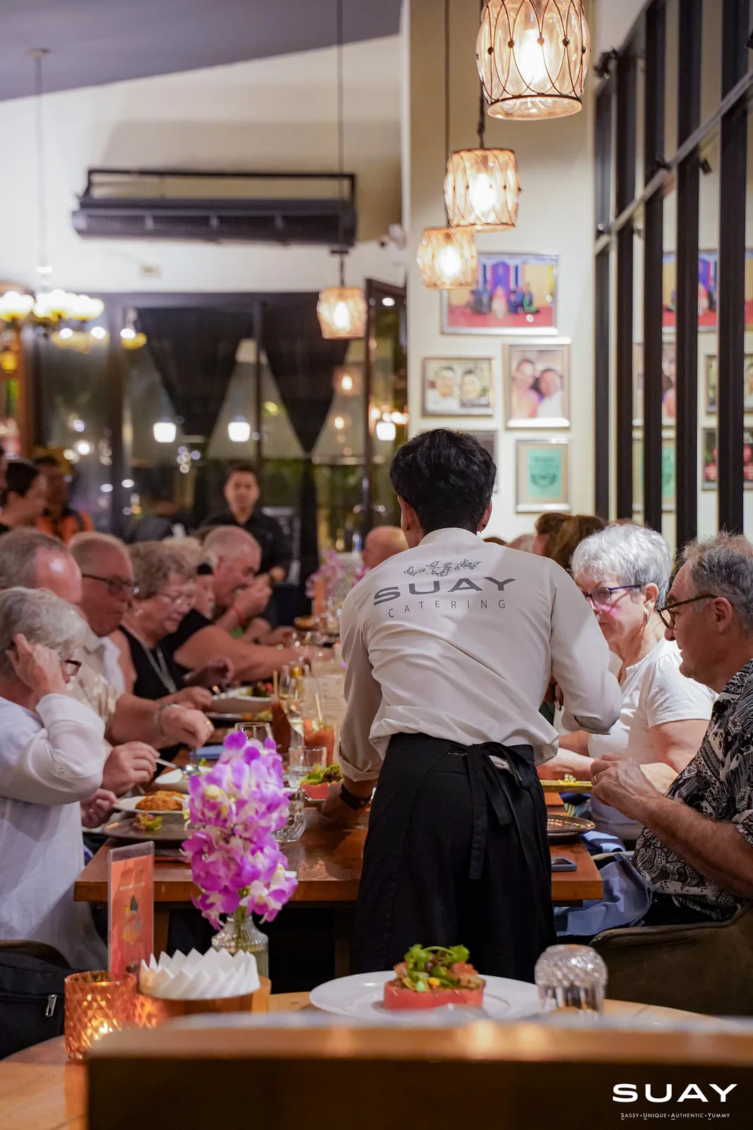 Server passing through the dining room